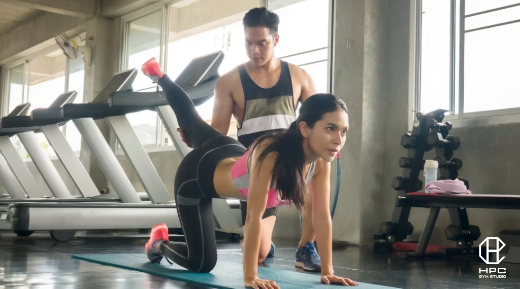 tập gym bị đau lưng